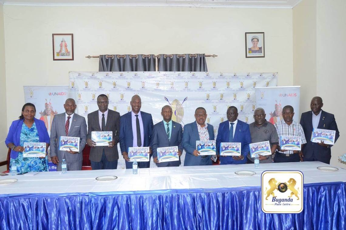 Owek. Robert Sserwanga (centre) unveils the 2025 Sports and Talent Development Plan